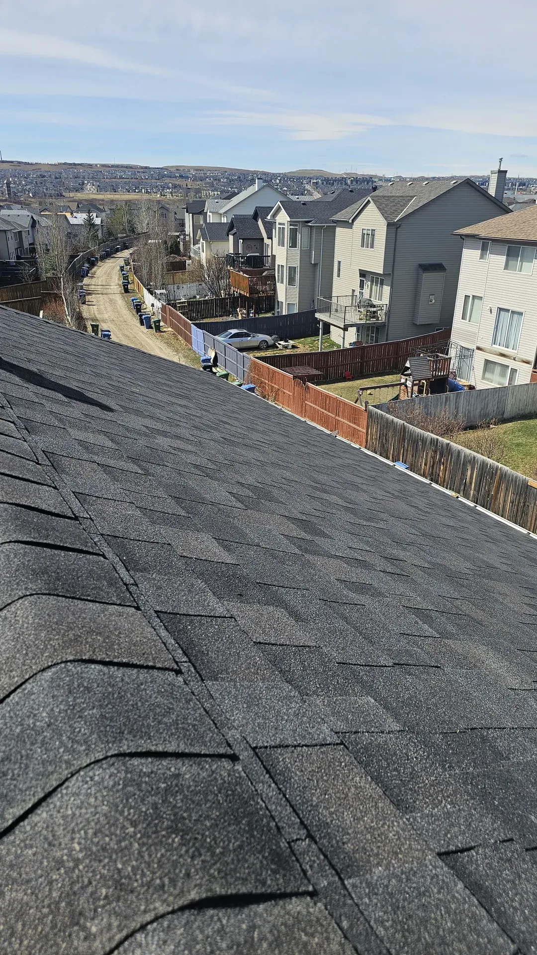 Ridge view of a completed Edmonton roof installation
