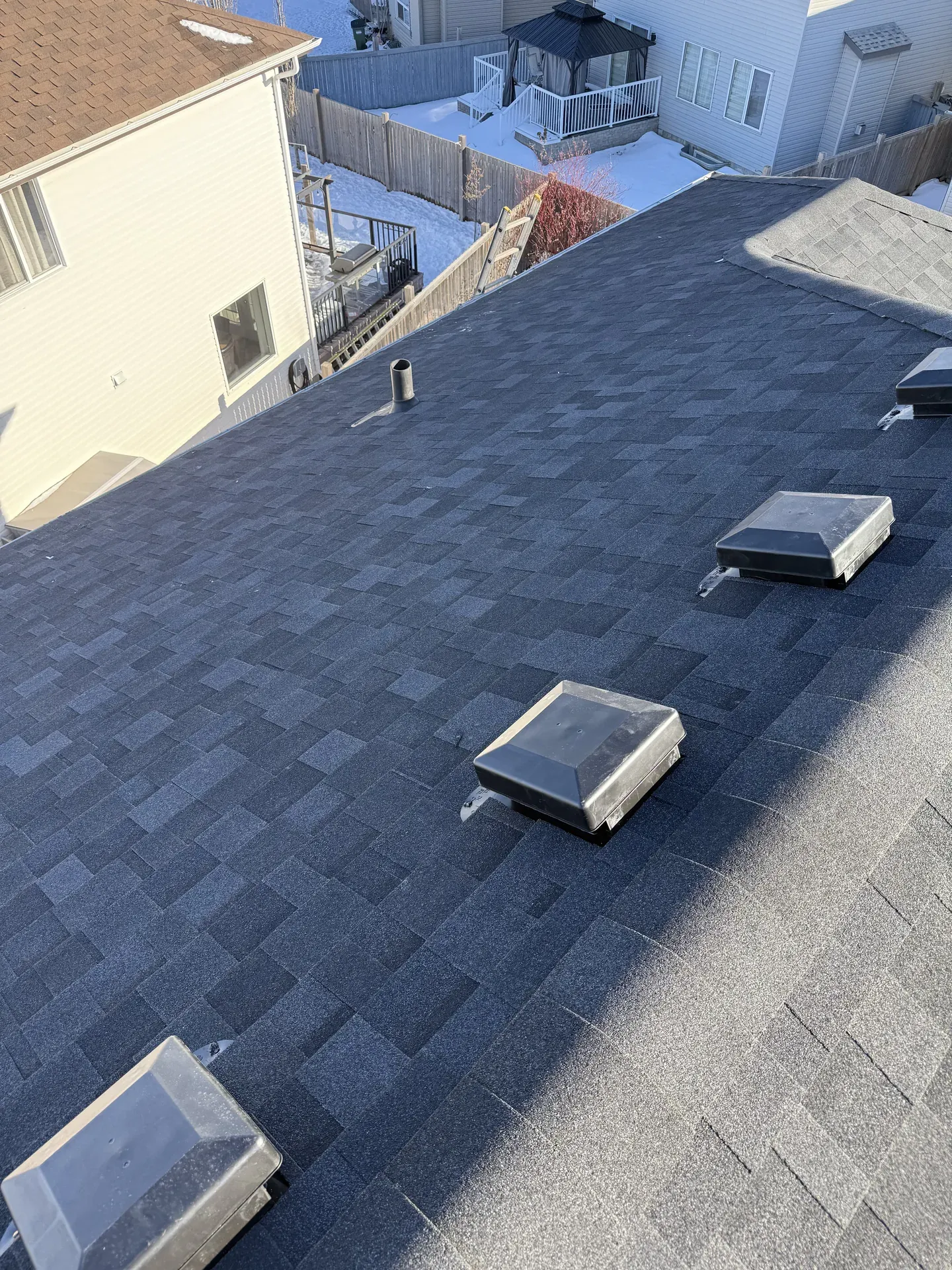 Up-close inspection of a completed roof by Royal Roofing Edmonton