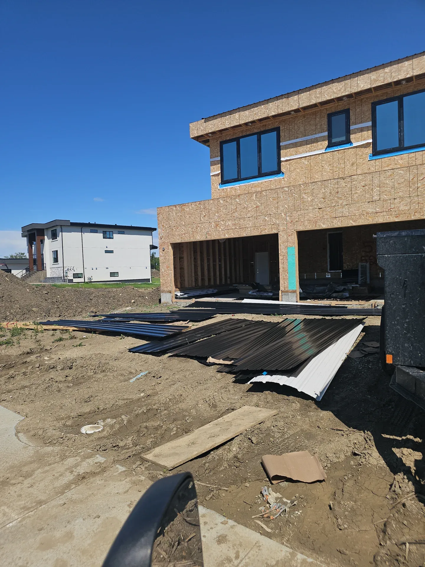 Siding prep on a new Edmonton build by Royal Roofing